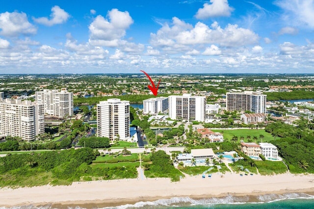 bird's eye view with a view of the beach and a water view