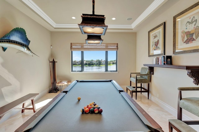 game room with ornamental molding, a tray ceiling, pool table, and tile patterned floors