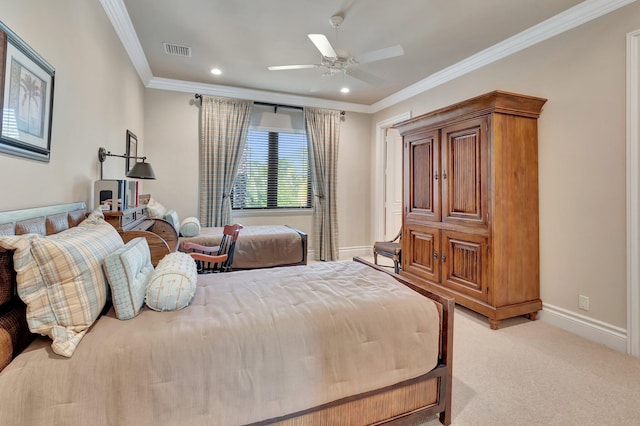 bedroom featuring ornamental molding, light carpet, and ceiling fan