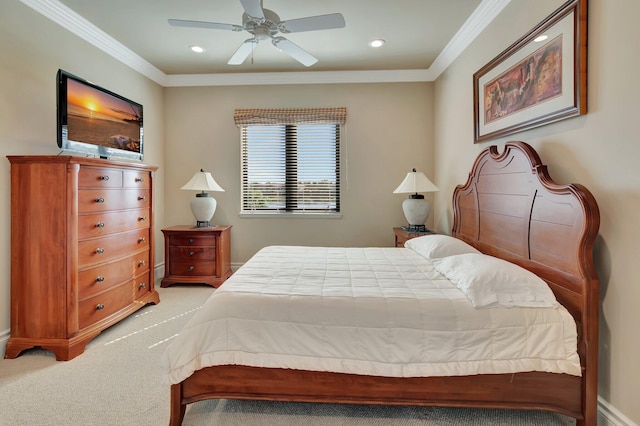 carpeted bedroom with crown molding and ceiling fan