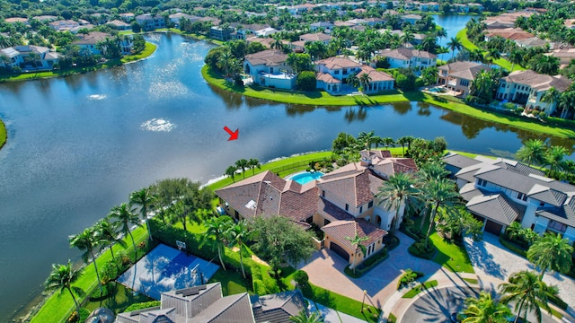 drone / aerial view featuring a water view