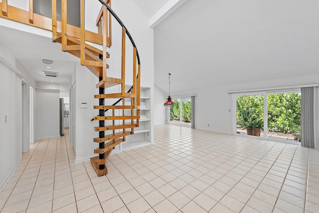 stairs with tile patterned floors