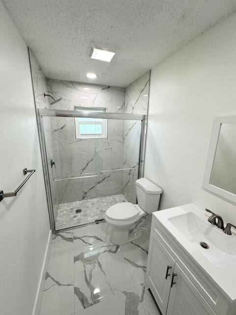 bathroom with vanity, toilet, and an enclosed shower