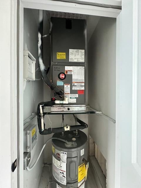 utility room with heating unit