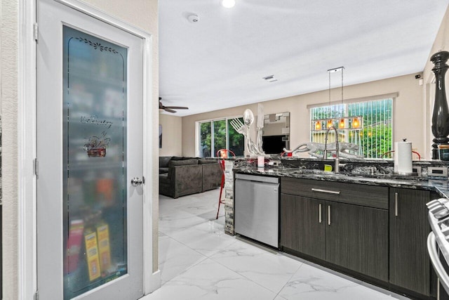 kitchen featuring stainless steel dishwasher, open floor plan, marble finish floor, and decorative light fixtures