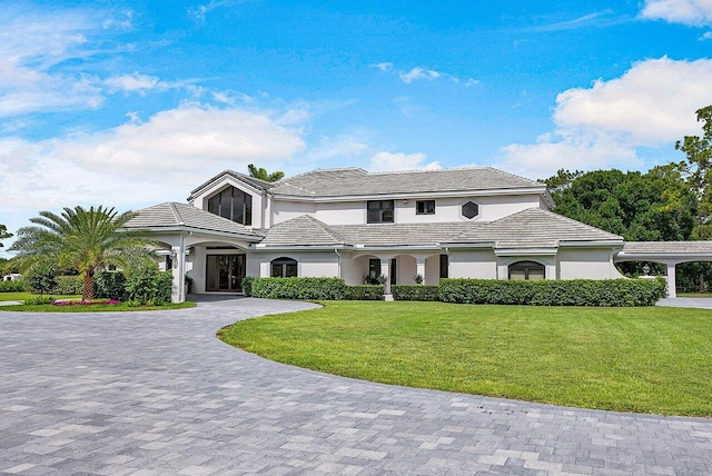 view of front of home featuring a front yard