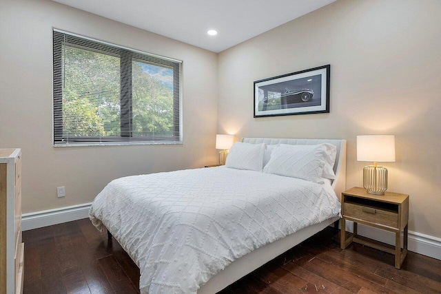 bedroom featuring dark hardwood / wood-style floors