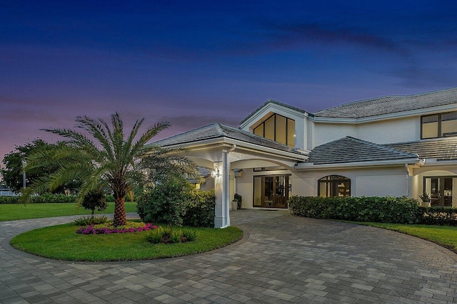 view of front of home with a yard