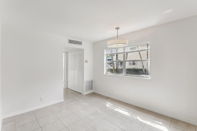 view of tiled empty room