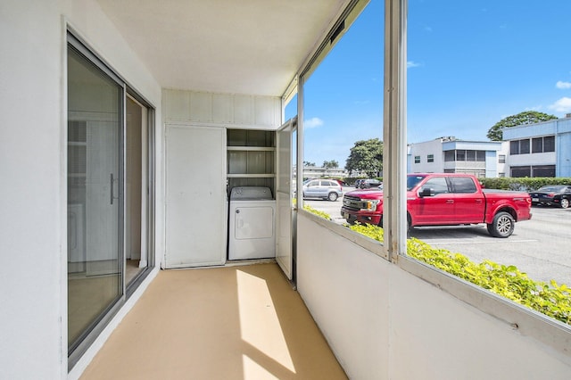 balcony featuring separate washer and dryer