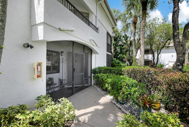 property entrance with a balcony