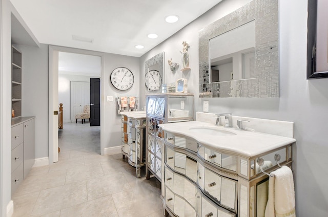 bathroom with tile patterned flooring and sink