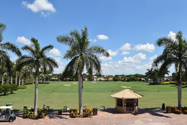 surrounding community with a yard and a gazebo