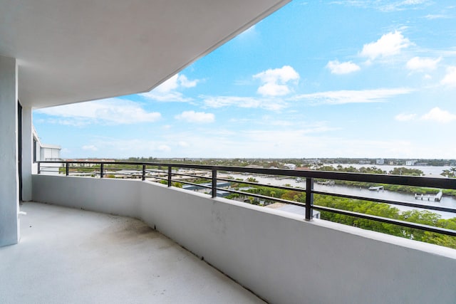 balcony featuring a water view