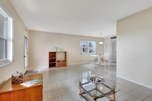 living room with light tile patterned floors