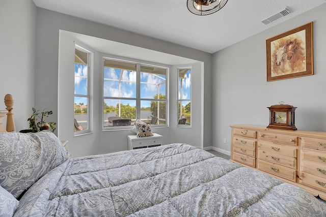 bedroom with a textured ceiling