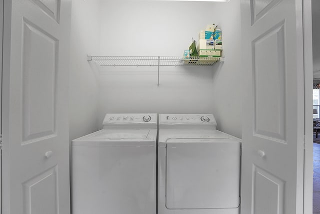 washroom with separate washer and dryer