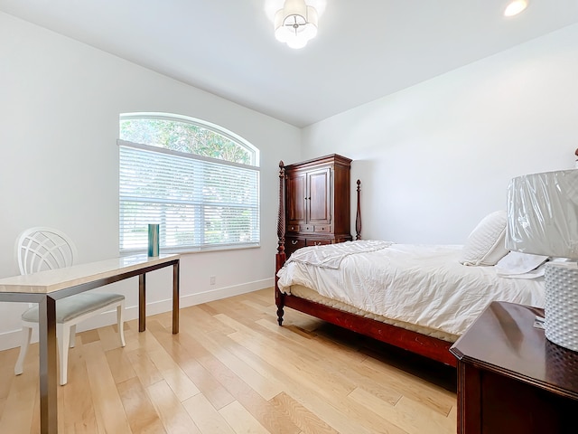 bedroom with light hardwood / wood-style flooring