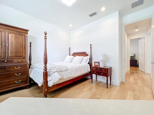 bedroom with light hardwood / wood-style floors