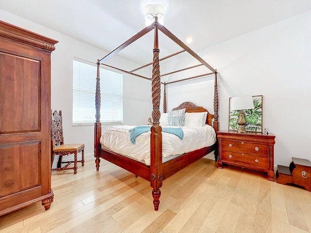 bedroom with light wood-type flooring