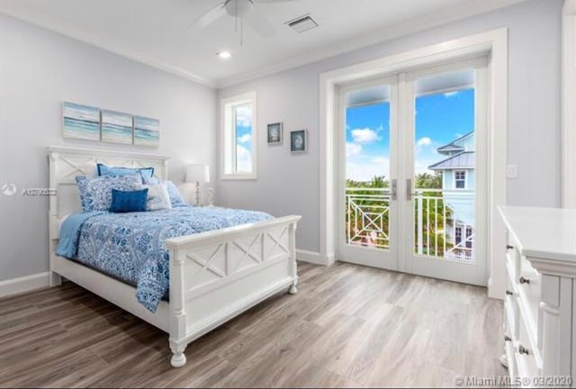 bedroom featuring access to outside, ornamental molding, wood-type flooring, and ceiling fan