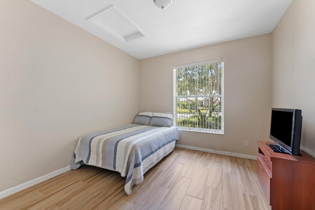 bedroom featuring light wood-type flooring