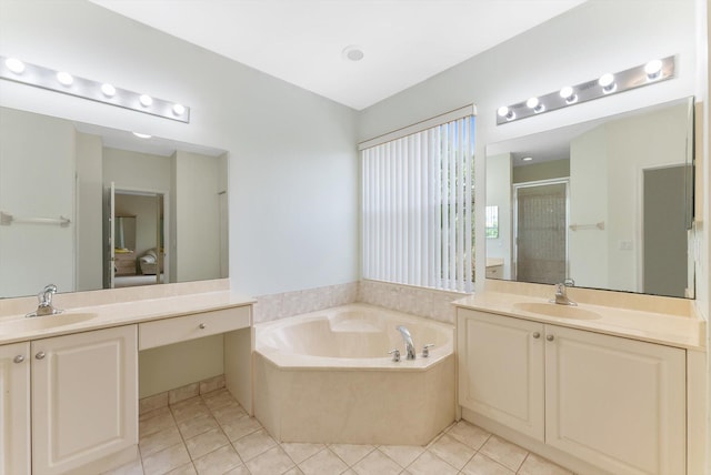 bathroom with plus walk in shower, tile patterned floors, and vanity