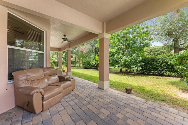 view of patio / terrace featuring ceiling fan