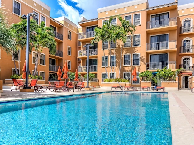 view of swimming pool featuring a patio