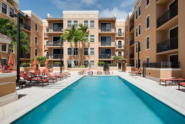 view of swimming pool with a patio area