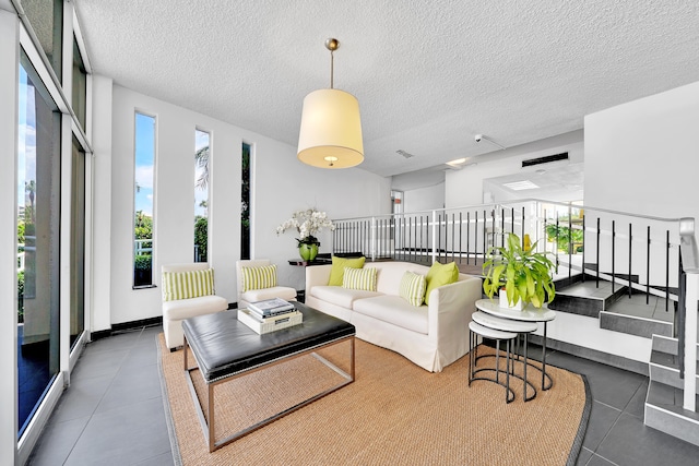 living room with a textured ceiling