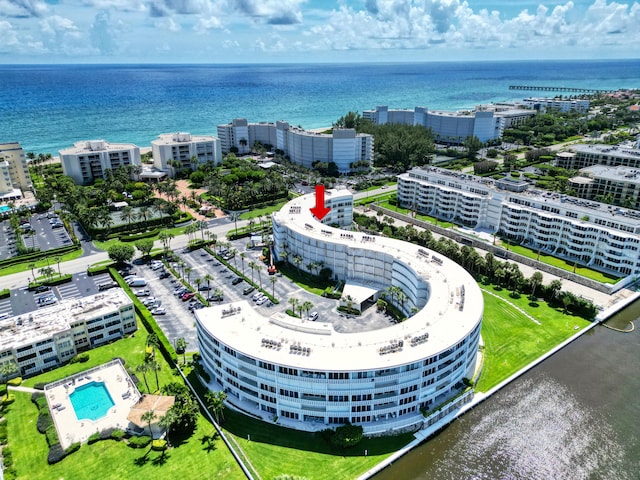 birds eye view of property featuring a water view