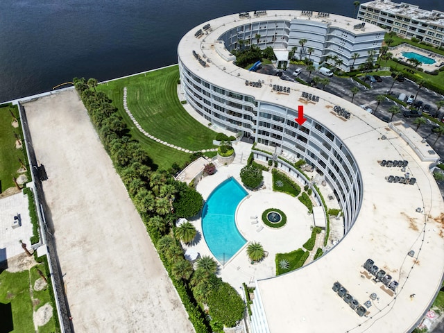 birds eye view of property featuring a water view