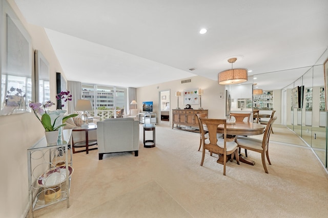 view of carpeted dining space