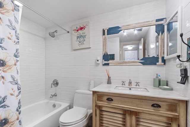 full bathroom featuring toilet, tile walls, shower / bath combo with shower curtain, decorative backsplash, and vanity