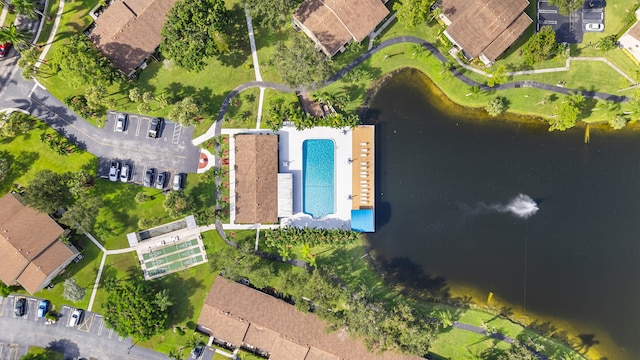 drone / aerial view with a water view