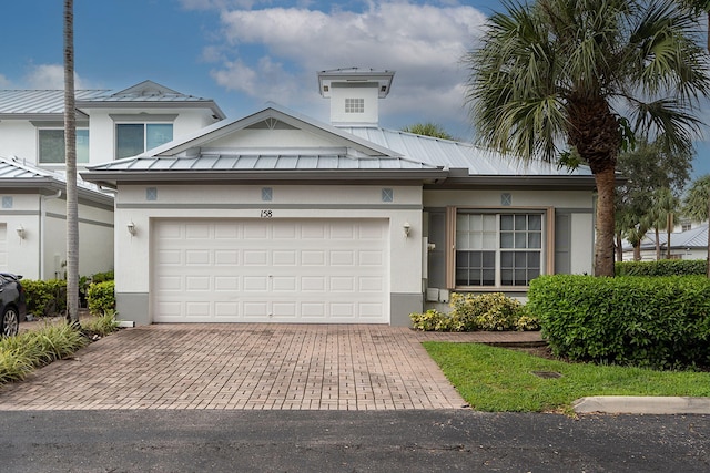 view of front of house with a garage