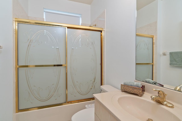 full bathroom featuring vanity, toilet, and enclosed tub / shower combo