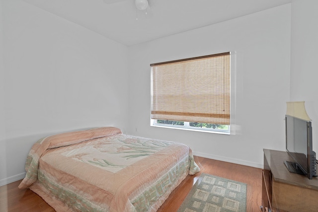 bedroom featuring ceiling fan and light hardwood / wood-style floors