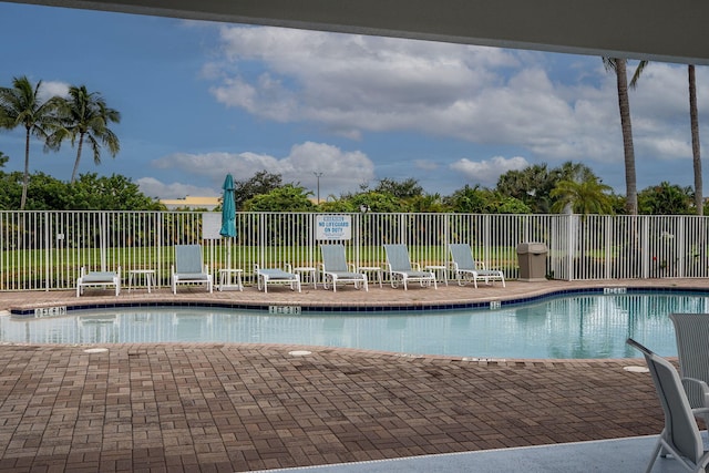 view of pool featuring a patio