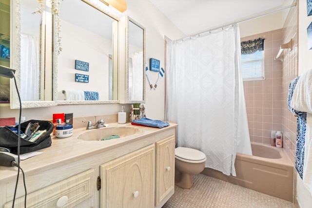 full bathroom featuring vanity, toilet, tile patterned floors, and shower / bathtub combination with curtain