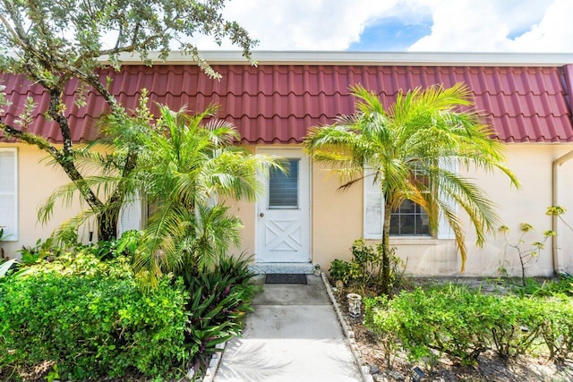 282 Cape Cod Cir Unit A, Lake Worth, FL 33467 - entrance to property featuring stucco siding and a tile roof
