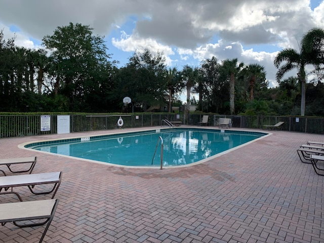 view of pool featuring a patio area