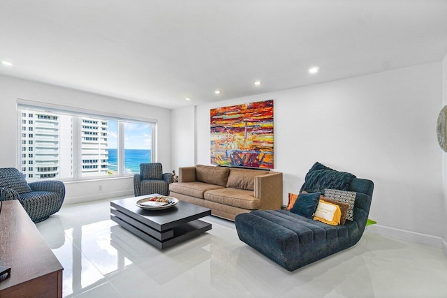 living room featuring a water view