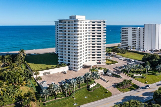 aerial view with a view of the beach and a water view