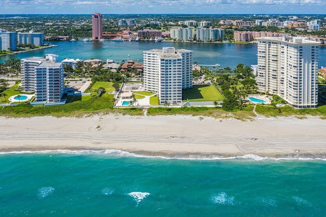 aerial view with a beach view and a water view