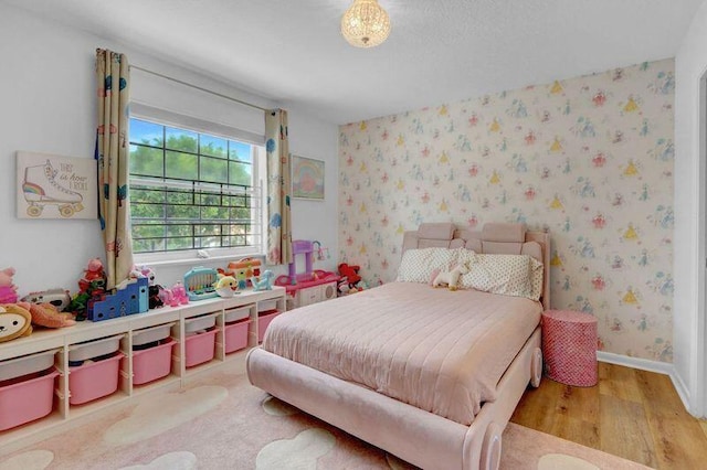 bedroom featuring hardwood / wood-style flooring