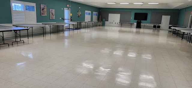 interior space featuring light tile patterned flooring