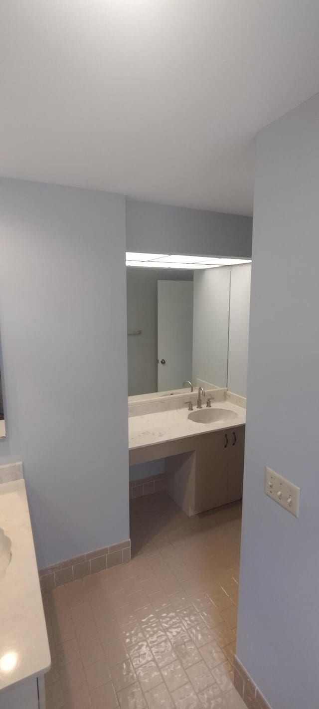 bathroom featuring vanity and tile patterned floors