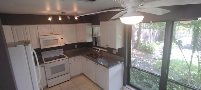 kitchen featuring ceiling fan, sink, white appliances, and white cabinetry